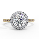 Top-down view of a yellow gold round brilliant diamond engagement ring with a striking double halo.