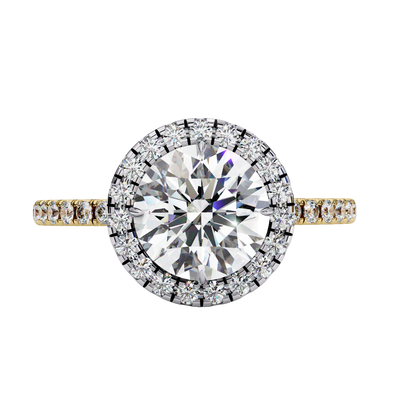 Top-down view of a yellow gold round brilliant diamond engagement ring with a striking double halo.