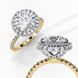 Close-up angled shot of a yellow gold round brilliant diamond double halo engagement ring highlighting the pavé band.