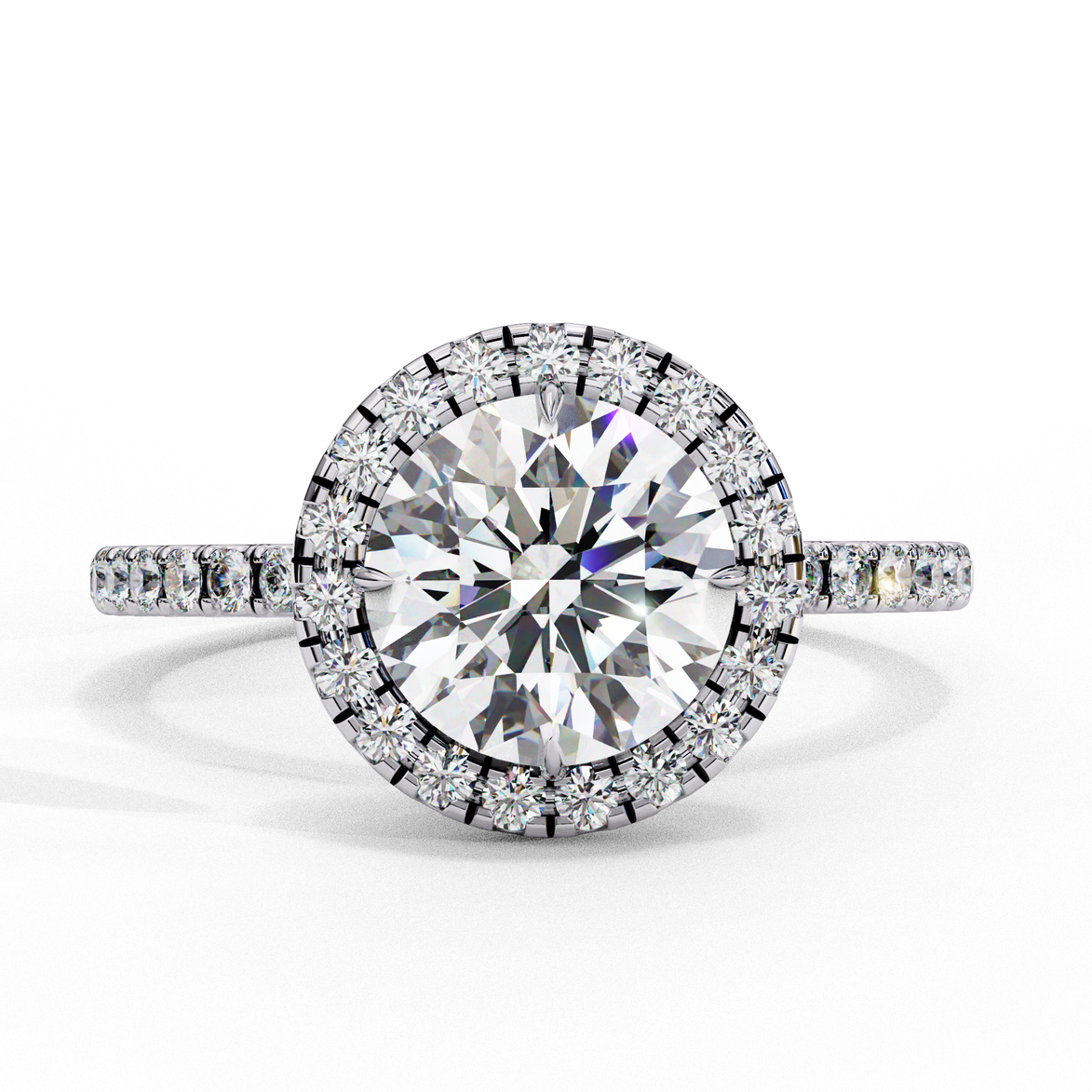 Top-down view of a white gold round brilliant diamond engagement ring with a striking double halo.