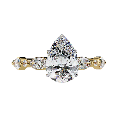 Yellow gold pear cut diamond ring, front view.