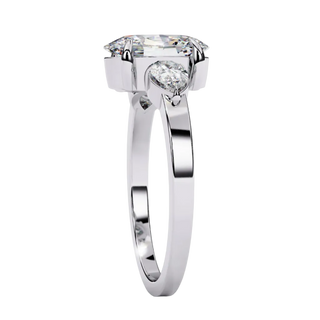 Side profile of white gold oval diamond ring band.