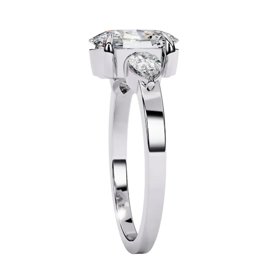 Side profile of white gold oval diamond ring band.