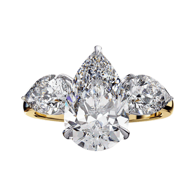 Front-facing view of a yellow gold pear-cut diamond three-stone ring.