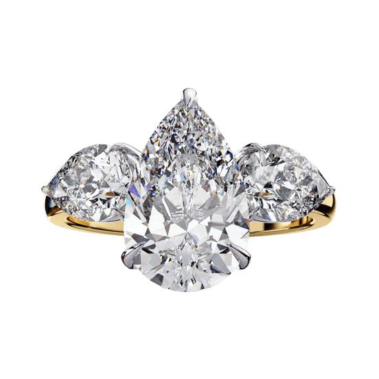 Front-facing view of a yellow gold pear-cut diamond three-stone ring.