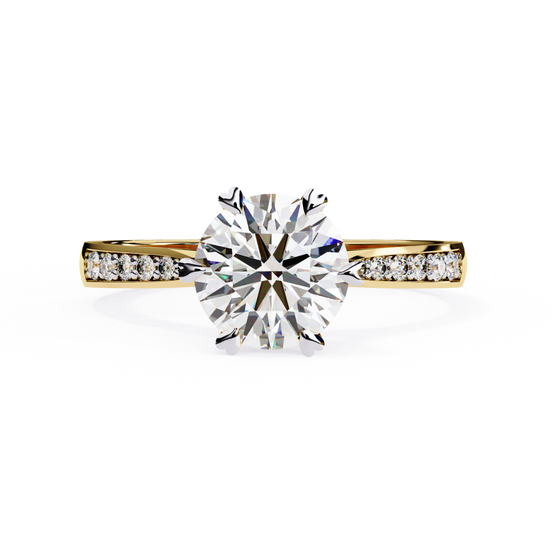 Front-facing view of a yellow gold round diamond pavé engagement ring.