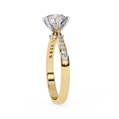 Side profile view of a yellow gold round diamond pavé engagement ring.