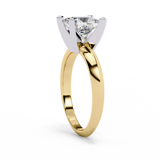 Side profile view of a yellow gold princess cut diamond solitaire ring.