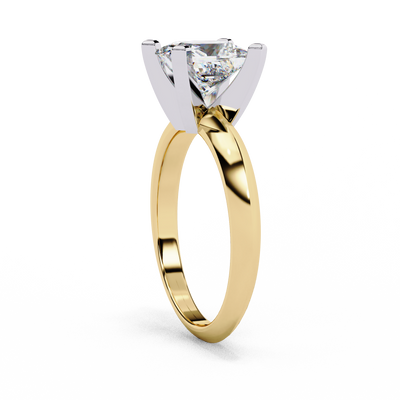 Side profile view of a yellow gold princess cut diamond solitaire ring.