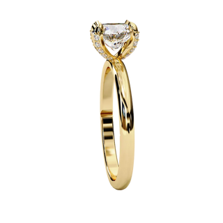 Side profile view of a yellow gold round hidden halo solitaire ring.
