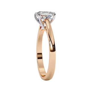 Side profile view of a rose gold princess cut diamond cathedral solitaire ring.
