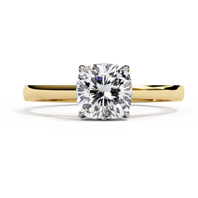 Front-facing view of a yellow gold cushion cut cathedral solitaire ring.