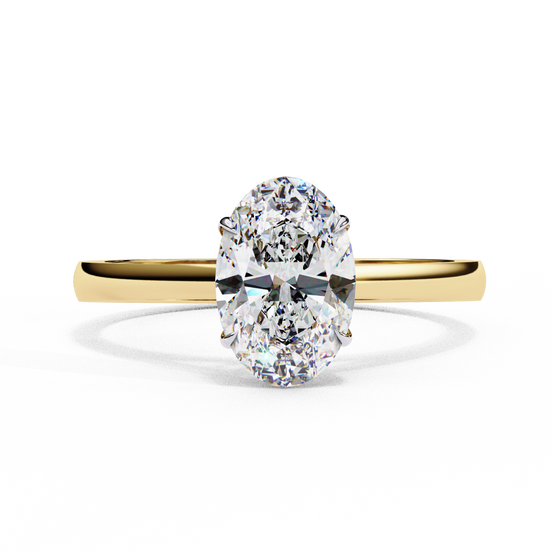 Front-facing view of a yellow gold oval diamond ring with elevated gallery.
