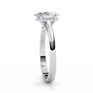 Side profile view of a white gold oval diamond ring with elevated gallery.