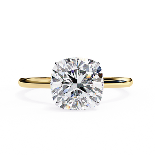 Front-facing view of a yellow gold classic cushion cut hidden halo ring.