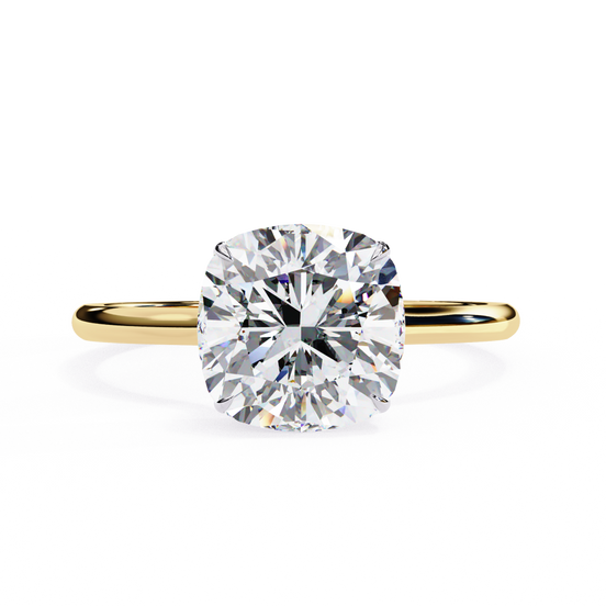 Front-facing view of a yellow gold classic cushion cut hidden halo ring.