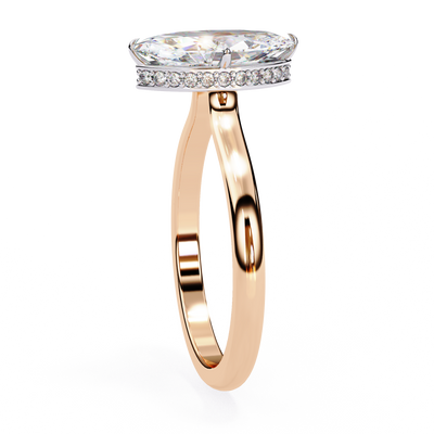 Side profile view of a rose gold marquise hidden halo diamond ring.