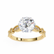Gold ring with a large diamond and smaller diamonds on the band against a white background