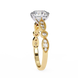 Gold ring with a diamond on a white background