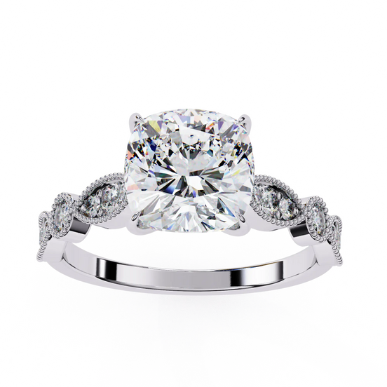 Diamond ring with a large central gemstone and smaller stones on a white background