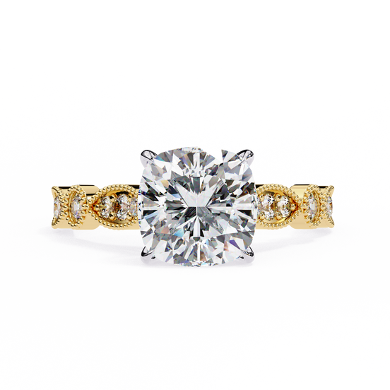 Gold ring with a large diamond on a white background