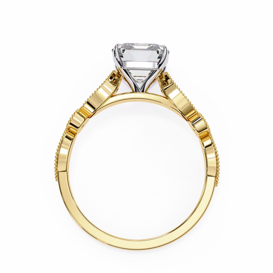 Gold ring with a diamond on a white background