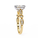 Gold ring with a diamond on a white background