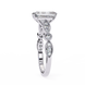 Silver ring with a diamond on a white background