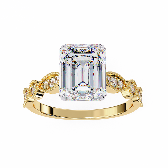 Gold ring with a large emerald-cut diamond and smaller diamonds on the band against a white background