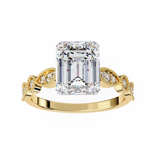 Gold ring with a large emerald-cut diamond and smaller diamonds on the band against a white background