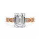 Diamond ring with rose gold band on a white background
