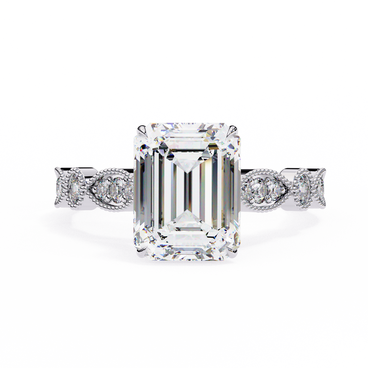 Diamond ring with emerald-cut center stone and diamond side stones on a white background