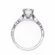Diamond ring with a white gemstone on a white background
