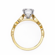 Gold ring with a diamond on a white background