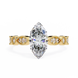Gold ring with a large marquise-shaped diamond on a white background
