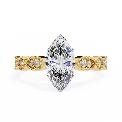 Gold ring with a large marquise-shaped diamond on a white background