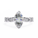 Diamond ring with a pear-shaped center stone on a white background
