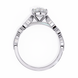 Diamond ring with a white gold band on a white background