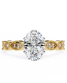 Gold ring with a large central diamond and smaller diamonds on the band against a white background