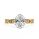 Gold ring with a large central diamond and smaller diamonds on the band against a white background