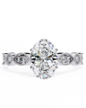 Diamond ring with a central oval-cut diamond on a white background