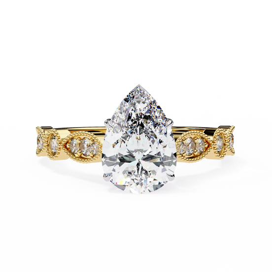Rose gold ring with a pear-shaped diamond on a white background