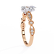Rose gold and white gold ring with diamonds on a white background