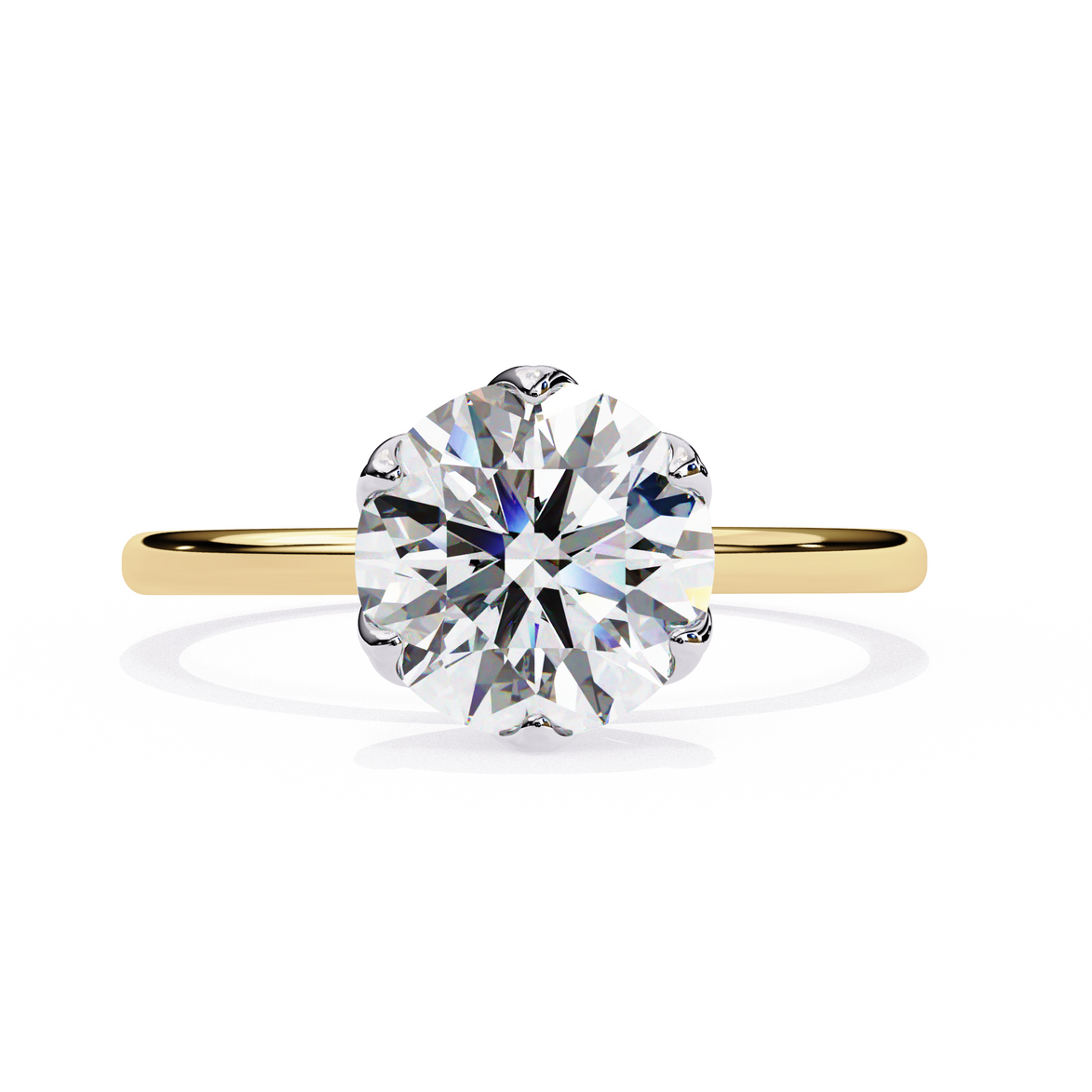 Gold ring with a large diamond on a white background