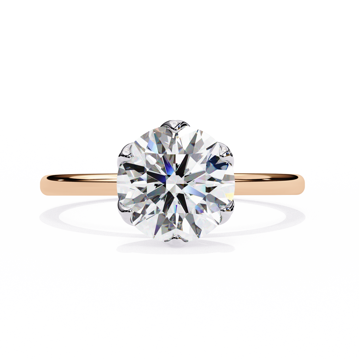 Diamond ring with rose gold band on a white background