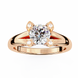Rose gold ring with a large diamond and smaller diamonds on the shoulders against a white background