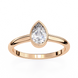 Rose gold ring with a pear-shaped diamond on a white background