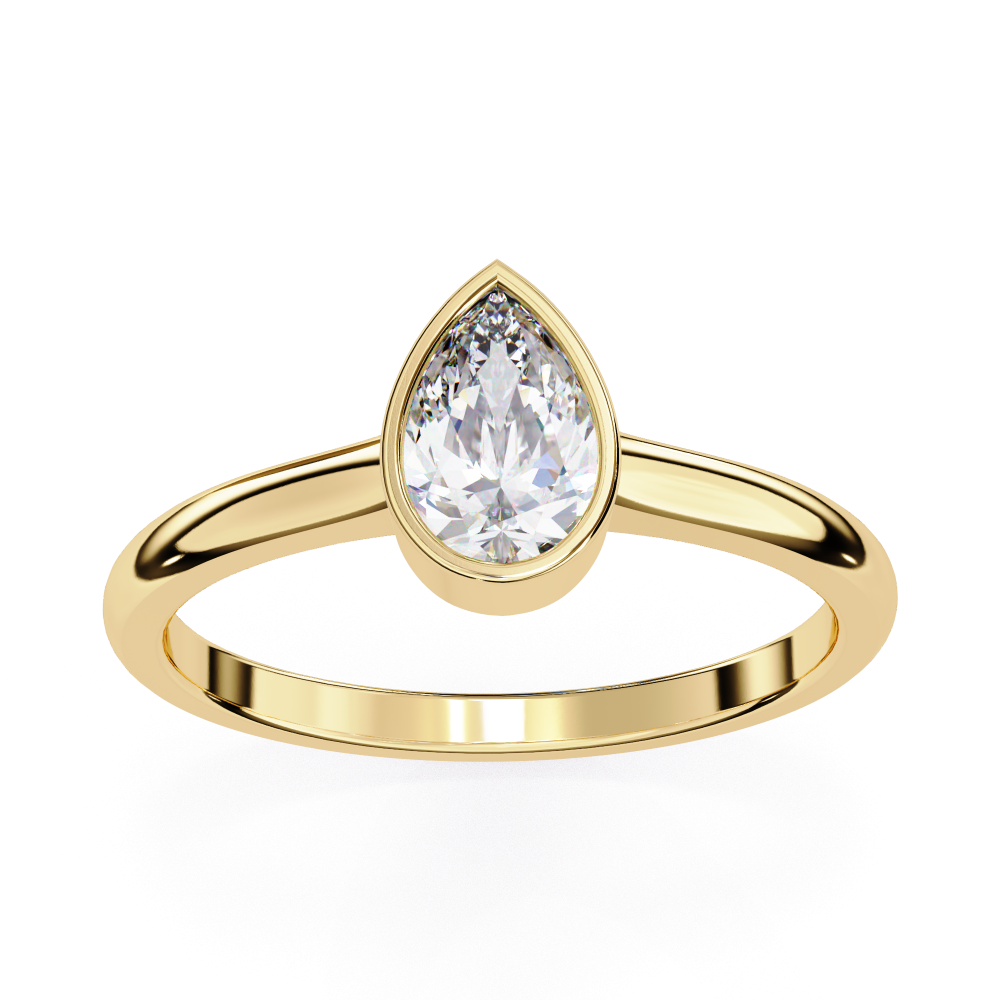 Gold ring with a pear-shaped diamond on a white background