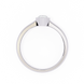Silver ring with a small gemstone on a white background