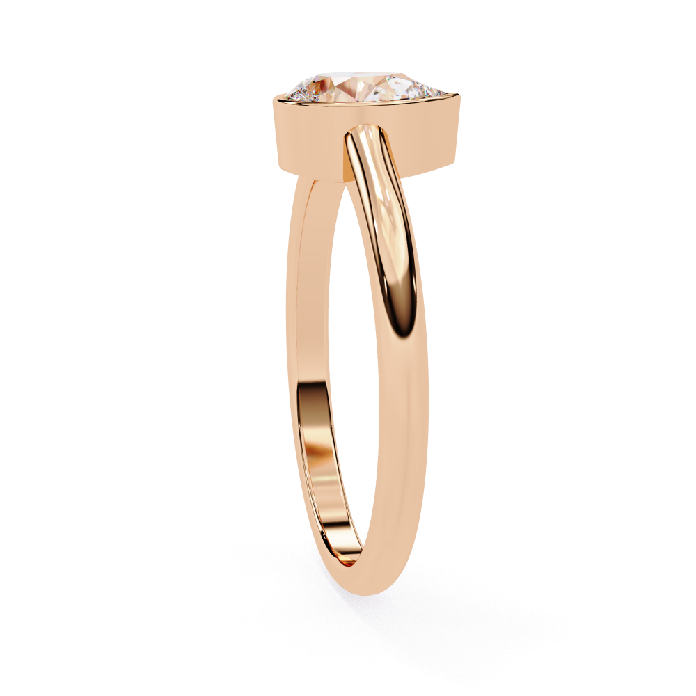 Gold ring with a diamond on a white background